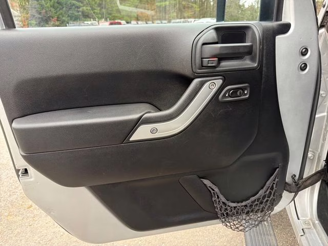 2012 Bright Silver Metallic Clearcoat Jeep Wrangler Unlimited Rubicon 4X4 SUV