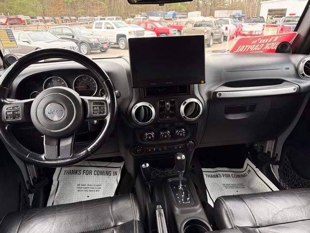 2012 Bright Silver Metallic Clearcoat Jeep Wrangler Unlimited Rubicon 4X4 SUV