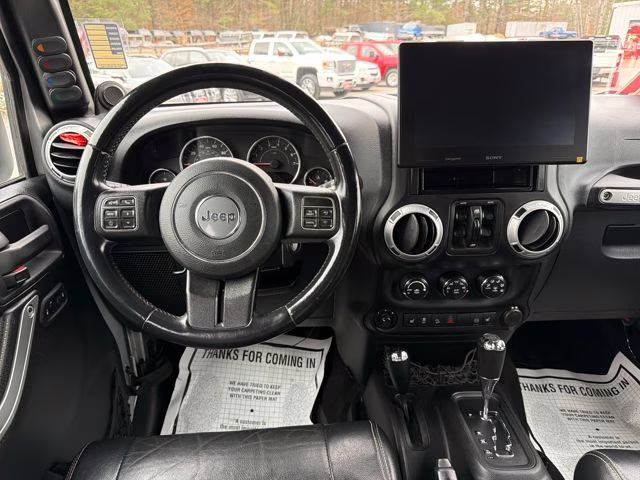 2012 Bright Silver Metallic Clearcoat Jeep Wrangler Unlimited Rubicon 4X4 SUV