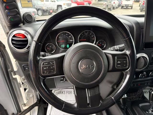 2012 Bright Silver Metallic Clearcoat Jeep Wrangler Unlimited Rubicon 4X4 SUV