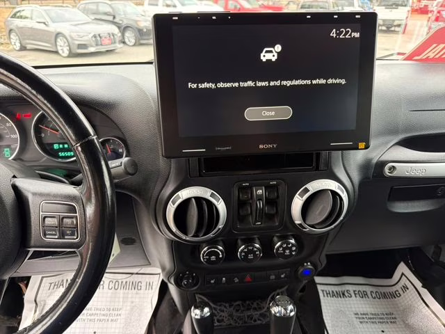 2012 Bright Silver Metallic Clearcoat Jeep Wrangler Unlimited Rubicon 4X4 SUV