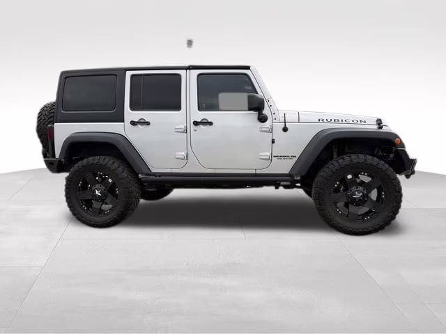 2012 Bright Silver Metallic Clearcoat Jeep Wrangler Unlimited Rubicon 4X4 SUV