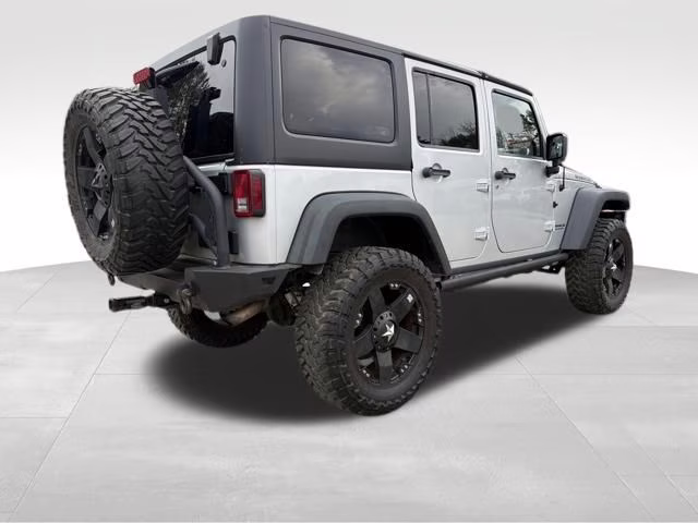 2012 Bright Silver Metallic Clearcoat Jeep Wrangler Unlimited Rubicon 4X4 SUV