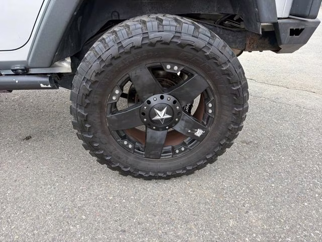 2012 Bright Silver Metallic Clearcoat Jeep Wrangler Unlimited Rubicon 4X4 SUV