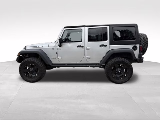 2012 Bright Silver Metallic Clearcoat Jeep Wrangler Unlimited Rubicon 4X4 SUV