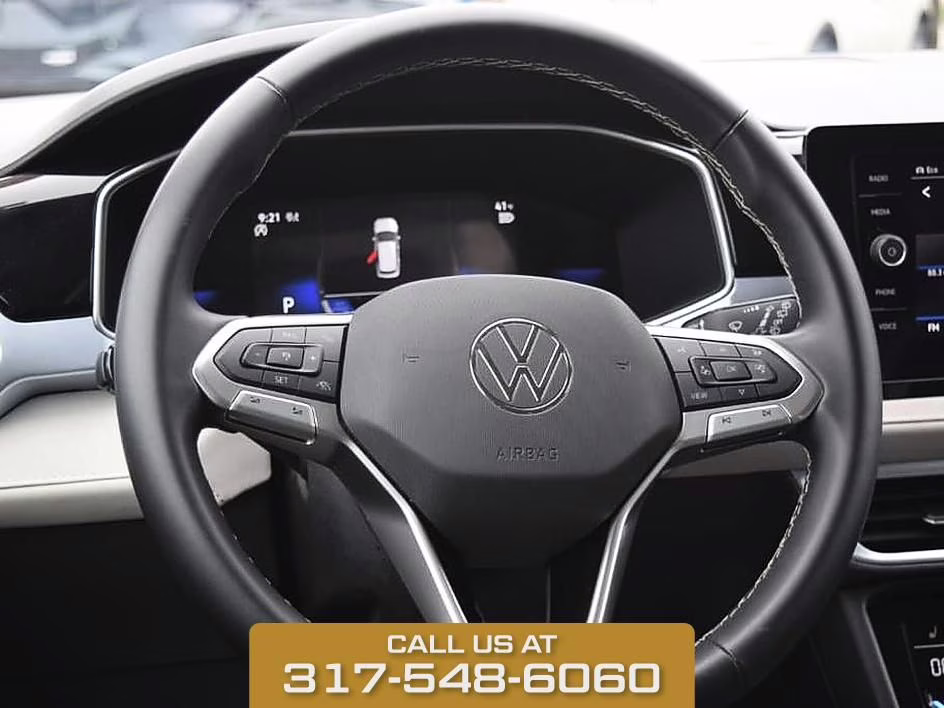 2025 Black Volkswagen Taos 1.5T SE AWD SUV