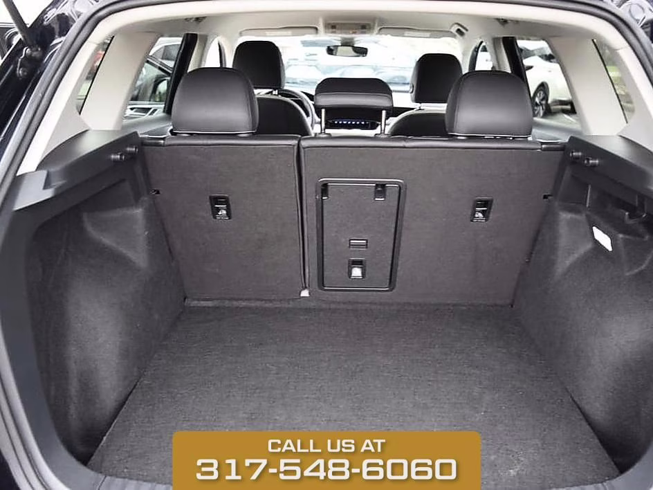 2025 Black Volkswagen Taos 1.5T SE AWD SUV