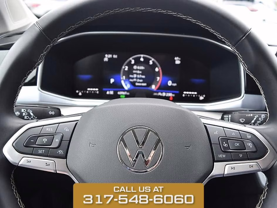 2025 Black Volkswagen Taos 1.5T SE AWD SUV