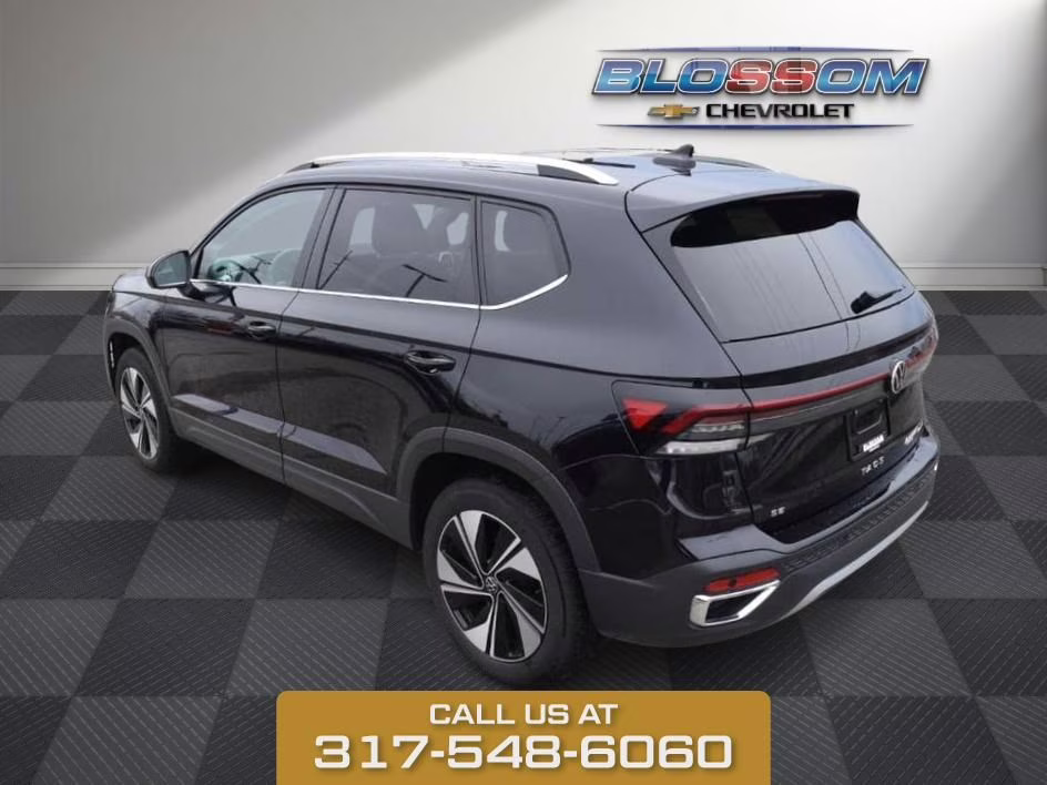 2025 Black Volkswagen Taos 1.5T SE AWD SUV