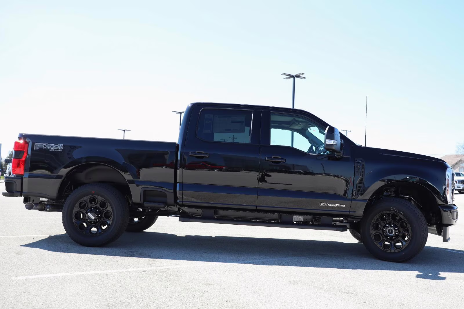 2026 Agate Black Metallic Ford Super Duty F-250 SRW LARIAT 4X4 Truck