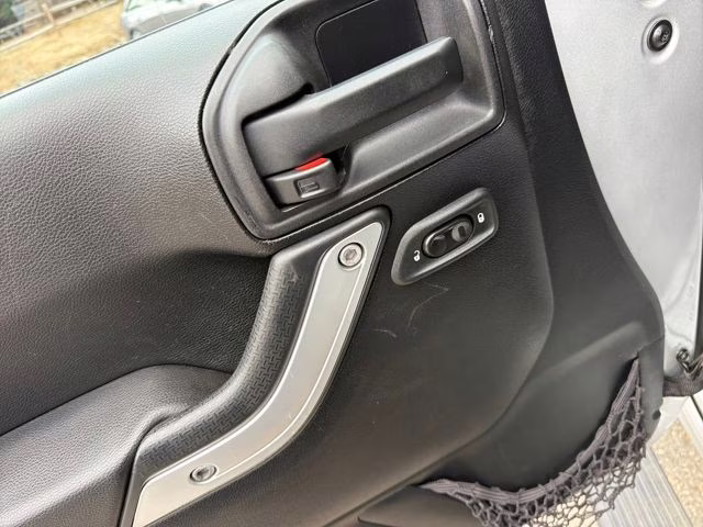 2012 Bright Silver Metallic Clearcoat Jeep Wrangler Unlimited Rubicon 4X4 SUV