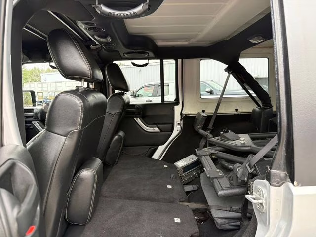 2012 Bright Silver Metallic Clearcoat Jeep Wrangler Unlimited Rubicon 4X4 SUV