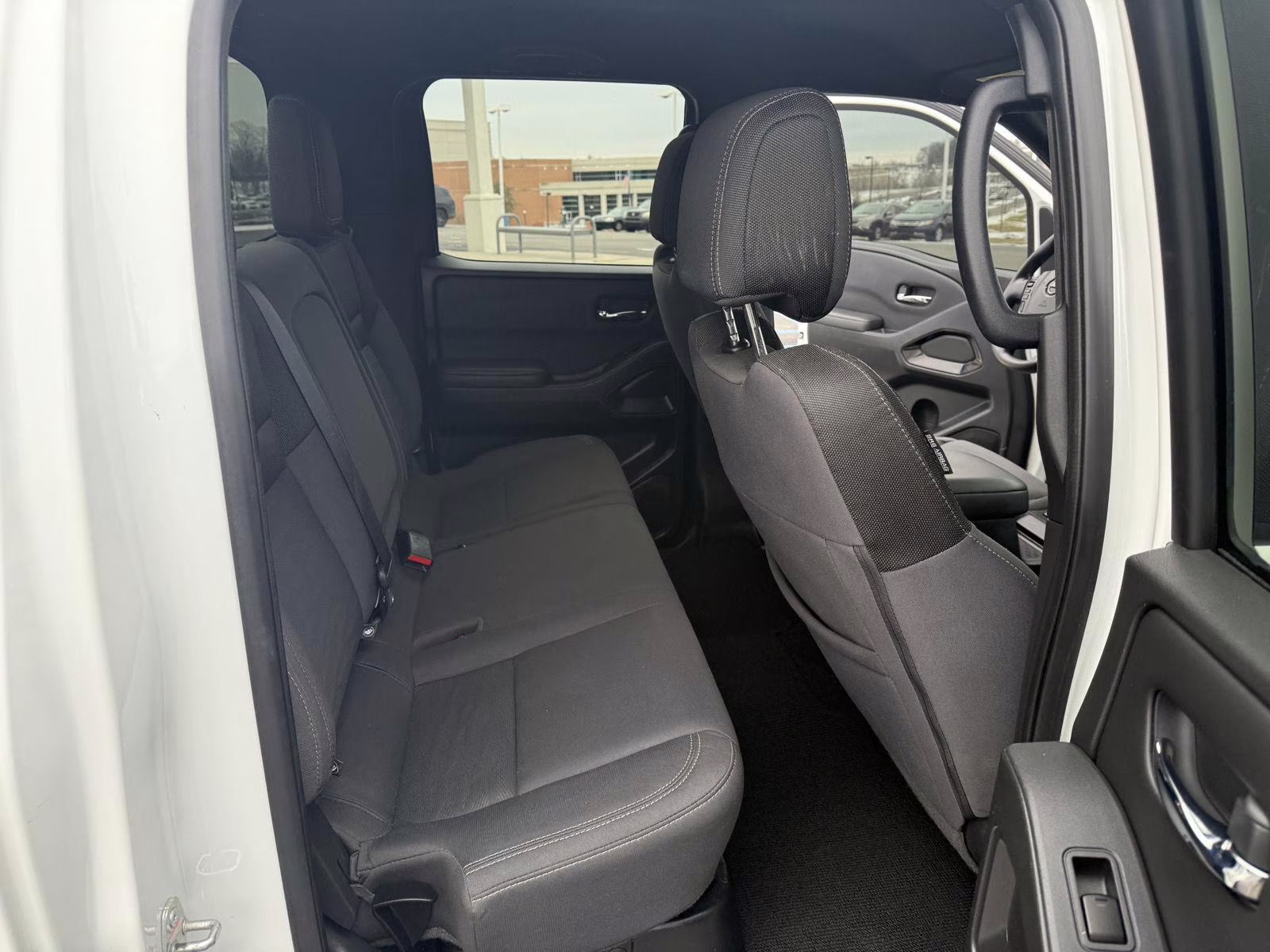 2023 Glacier White Nissan Frontier SV 4X4 Truck