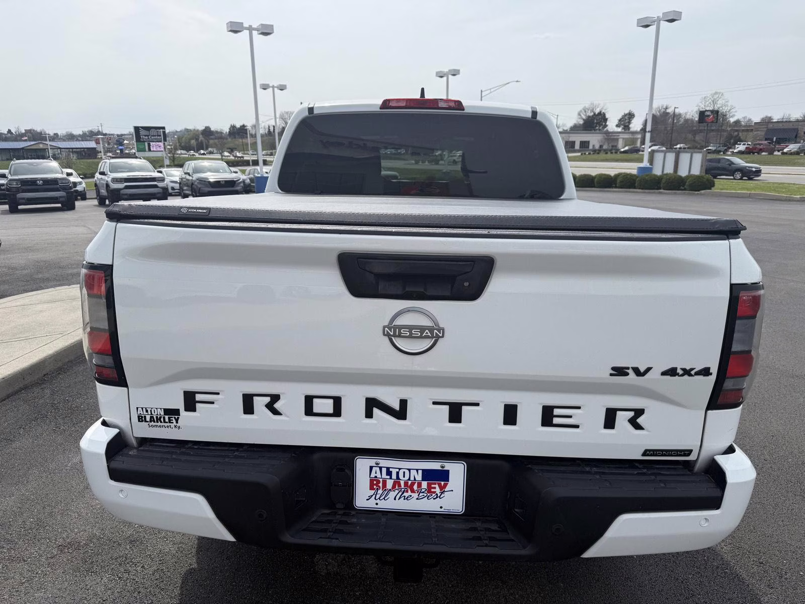 2023 Glacier White Nissan Frontier SV 4X4 Truck