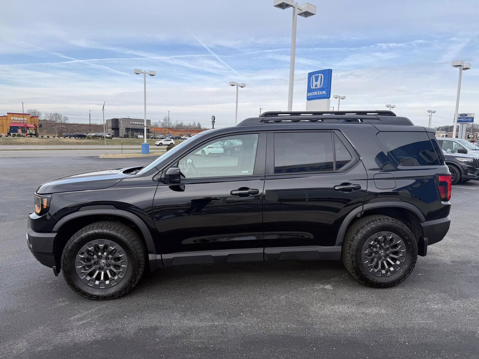 2026 Crystal Black Pearl Honda Passport TrailSport AWD SUV