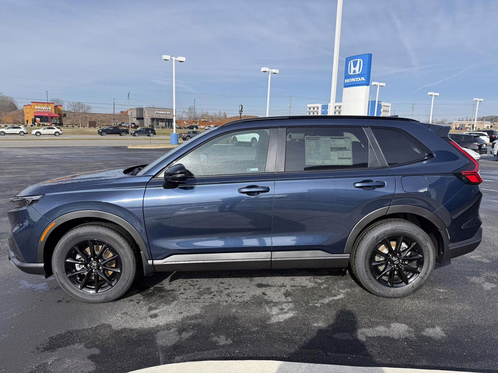 2026 Canyon River Blue Metallic Honda CR-V Hybrid Sport-L AWD SUV
