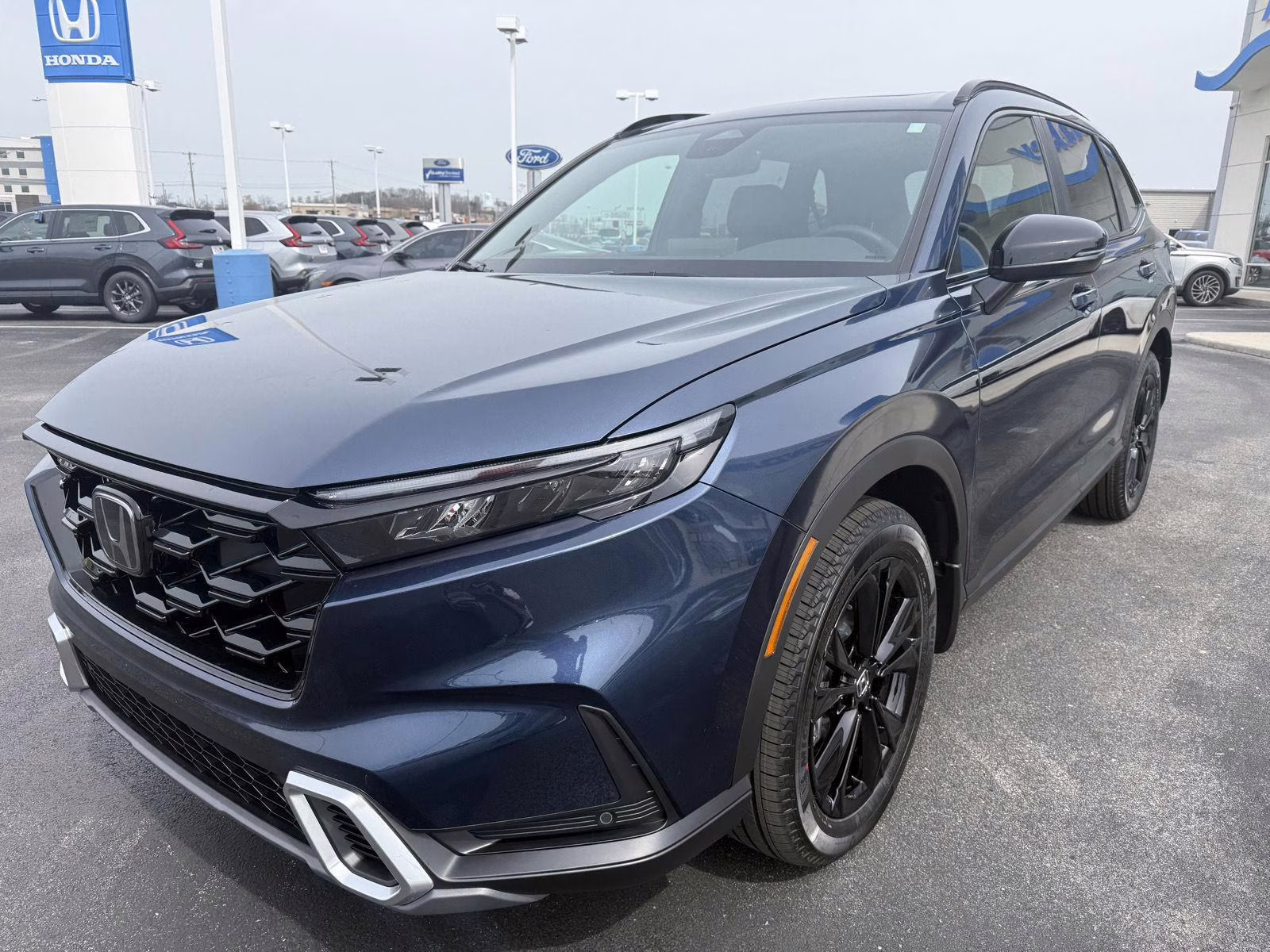 2026 Canyon River Blue Metallic Honda CR-V Hybrid Sport Touring AWD SUV