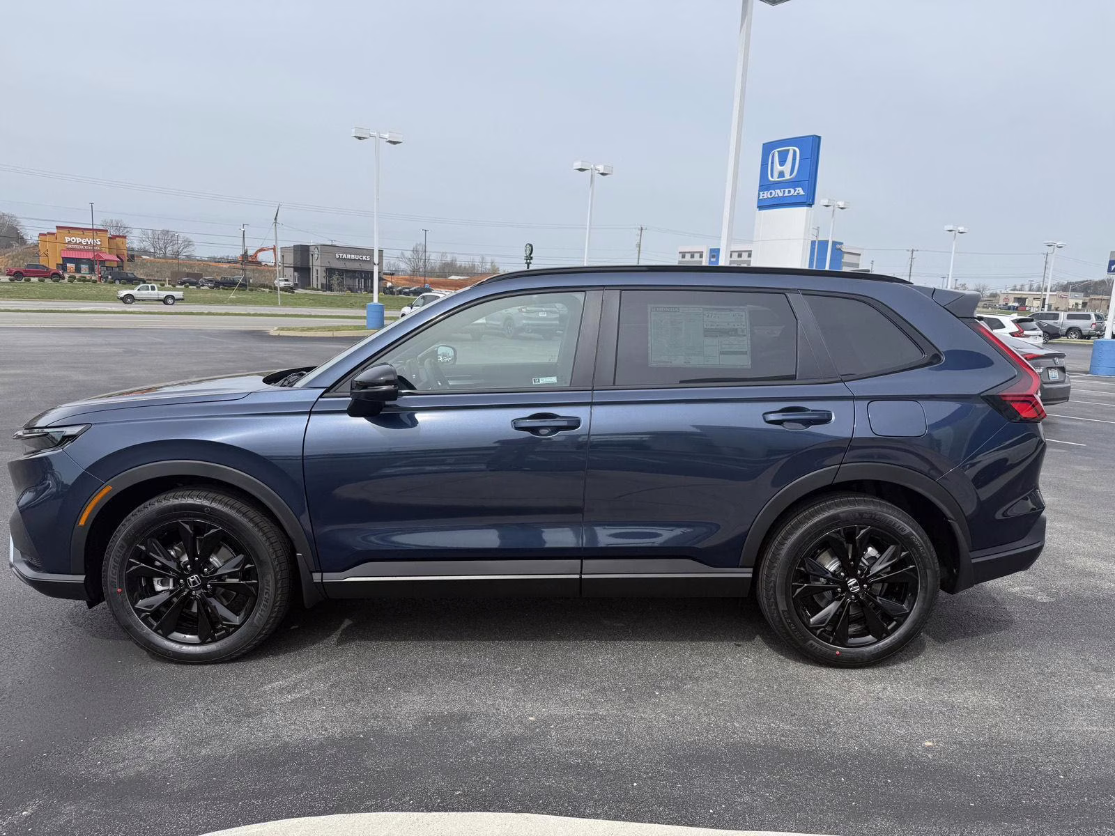 2026 Canyon River Blue Metallic Honda CR-V Hybrid Sport Touring AWD SUV
