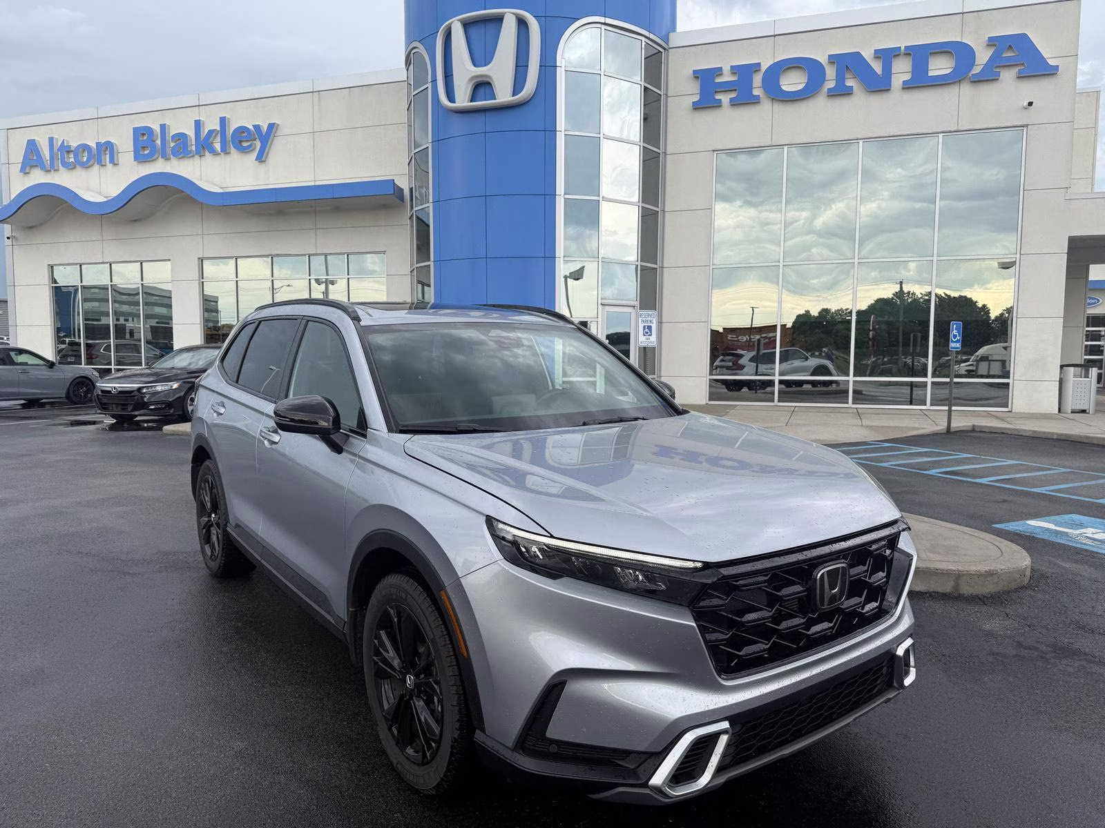 2026 Solar Silver Metallic Honda CR-V Hybrid Sport Touring AWD SUV