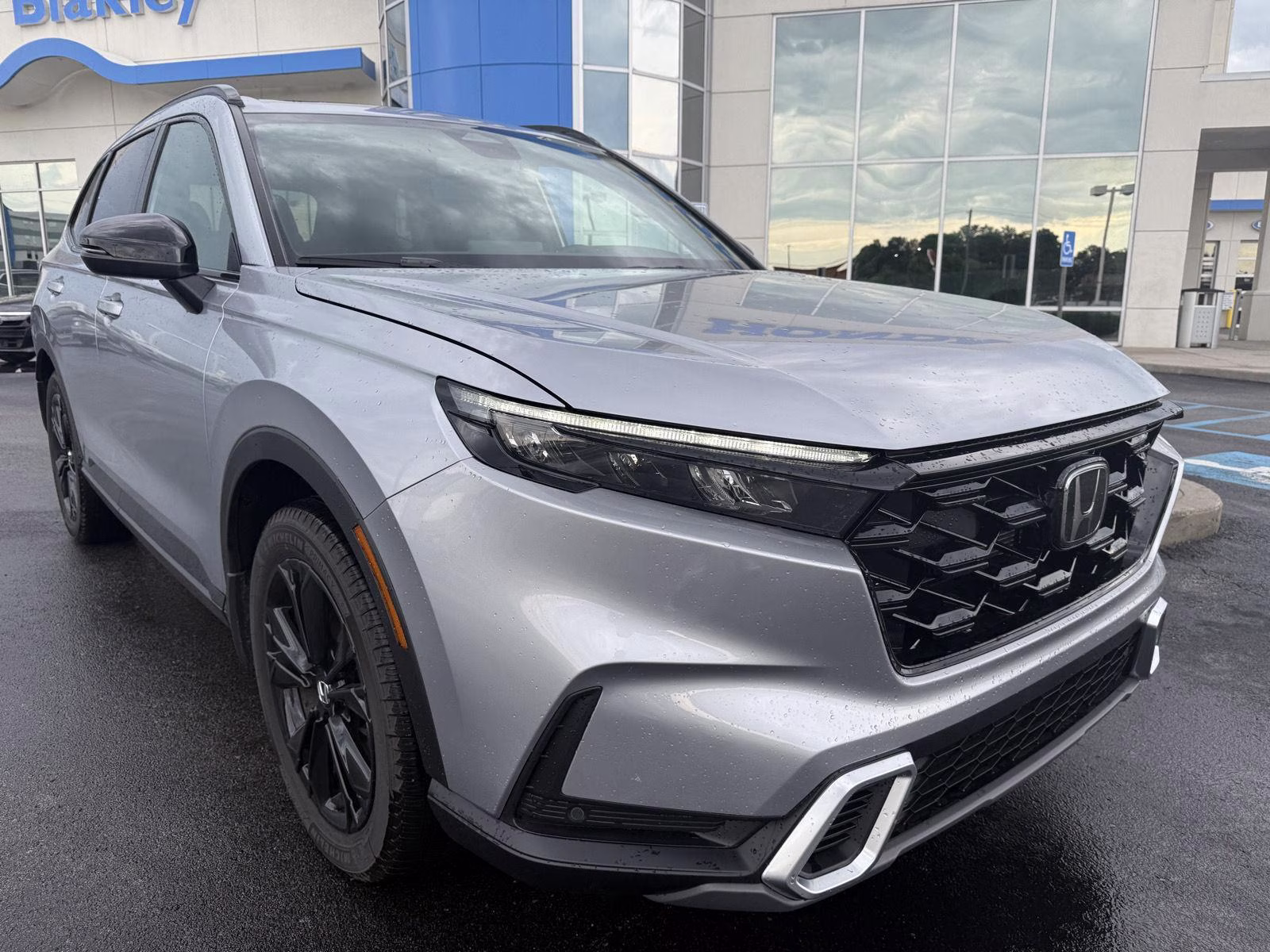 2026 Solar Silver Metallic Honda CR-V Hybrid Sport Touring AWD SUV
