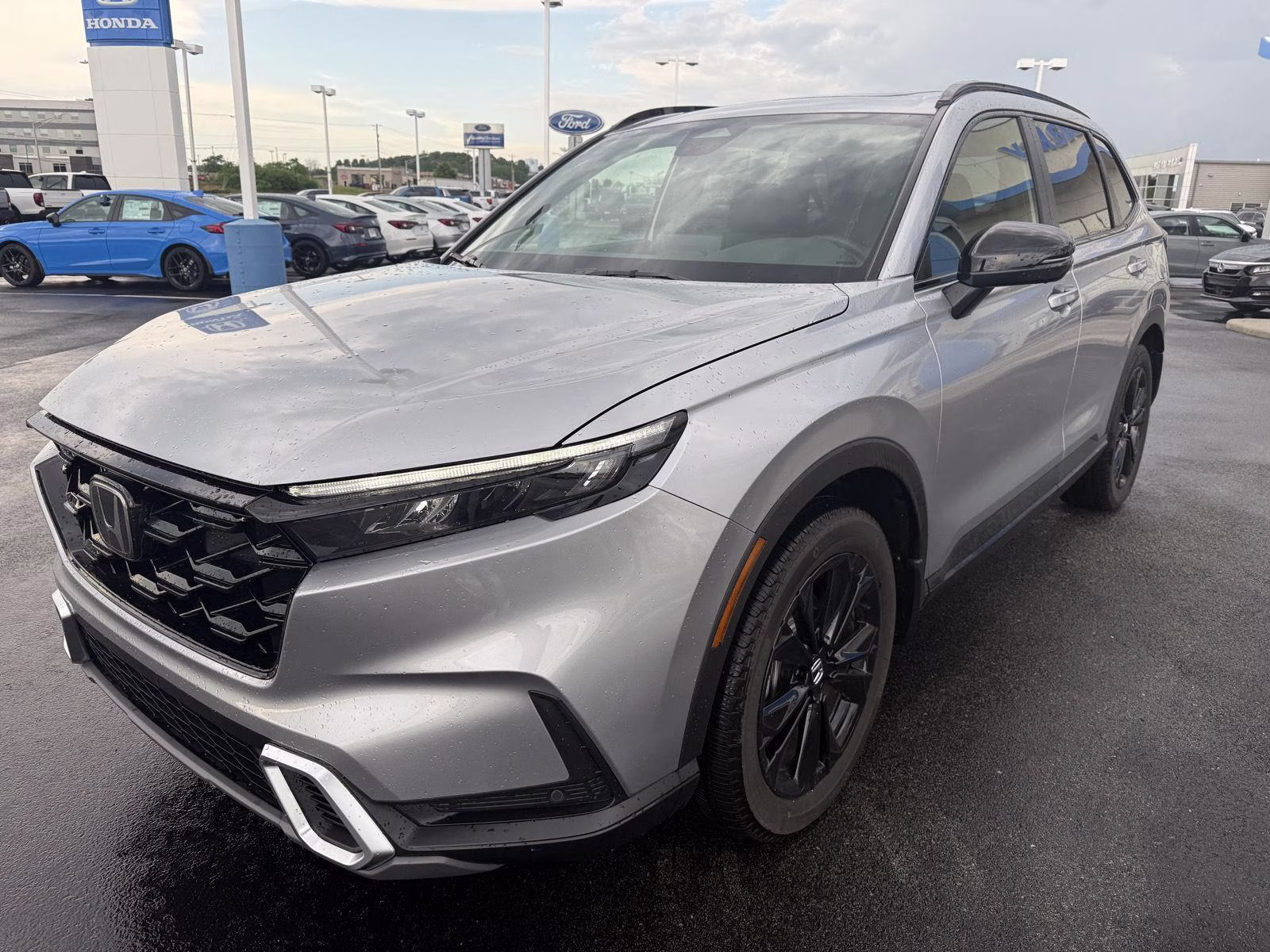 2026 Solar Silver Metallic Honda CR-V Hybrid Sport Touring AWD SUV