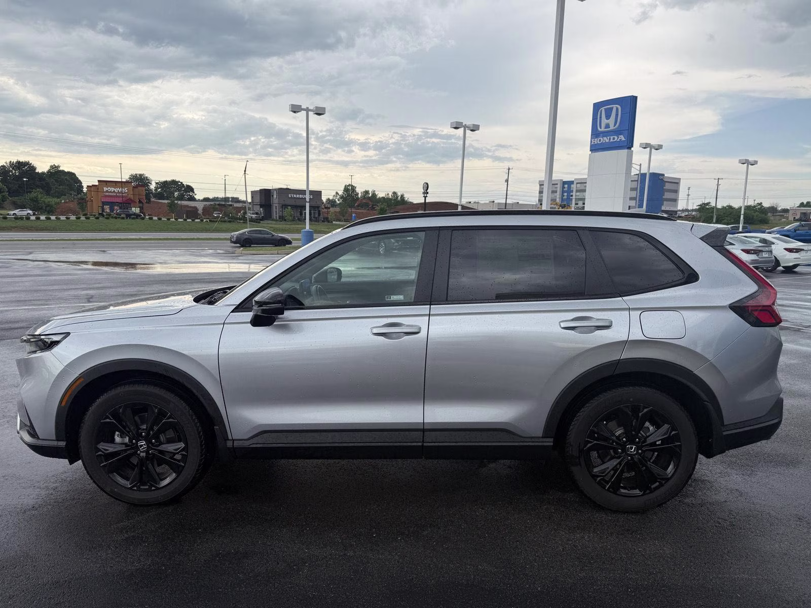 2026 Solar Silver Metallic Honda CR-V Hybrid Sport Touring AWD SUV
