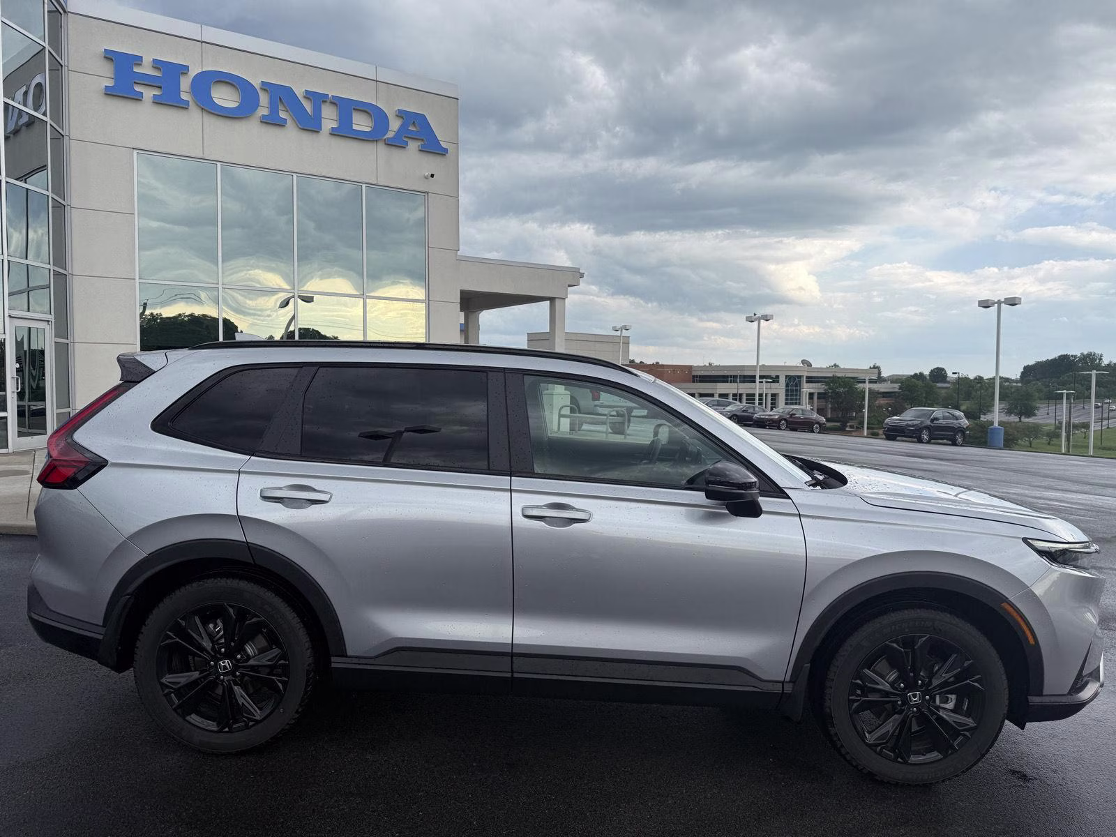 2026 Solar Silver Metallic Honda CR-V Hybrid Sport Touring AWD SUV