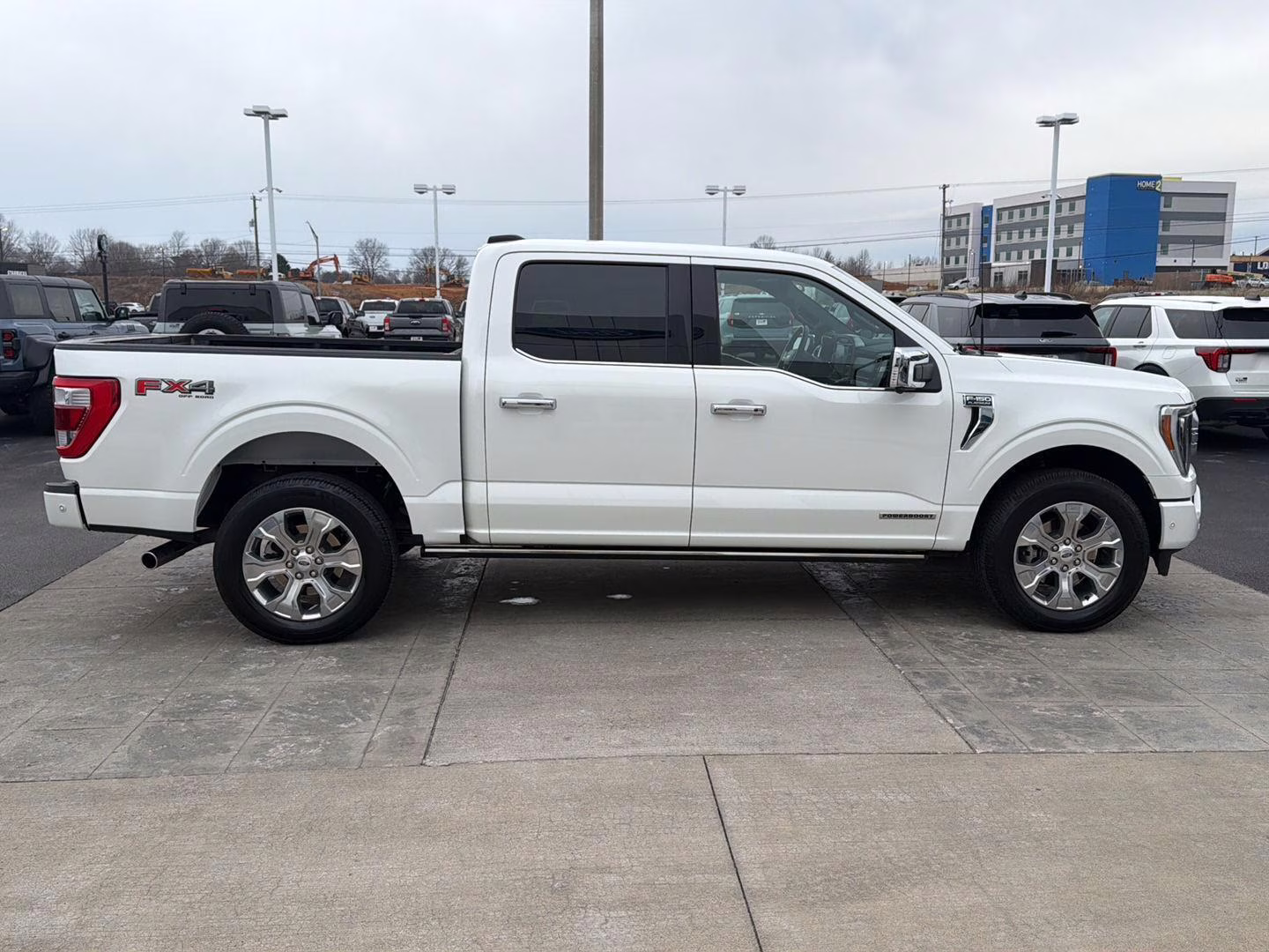 2023 Star White Metallic Tri-Coat Ford F-150 Platinum 4X4 Truck