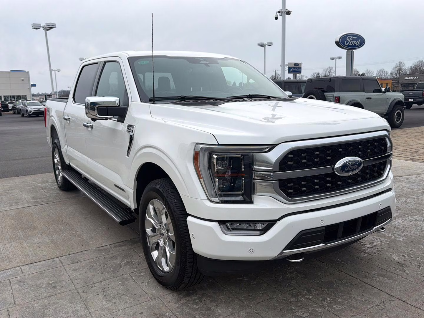 2023 Star White Metallic Tri-Coat Ford F-150 Platinum 4X4 Truck