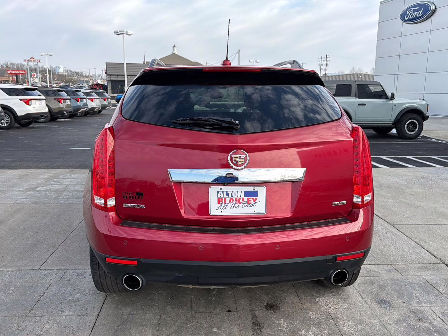 2016 Crystal Red Tintcoat Cadillac SRX Performance Collection FWD SUV