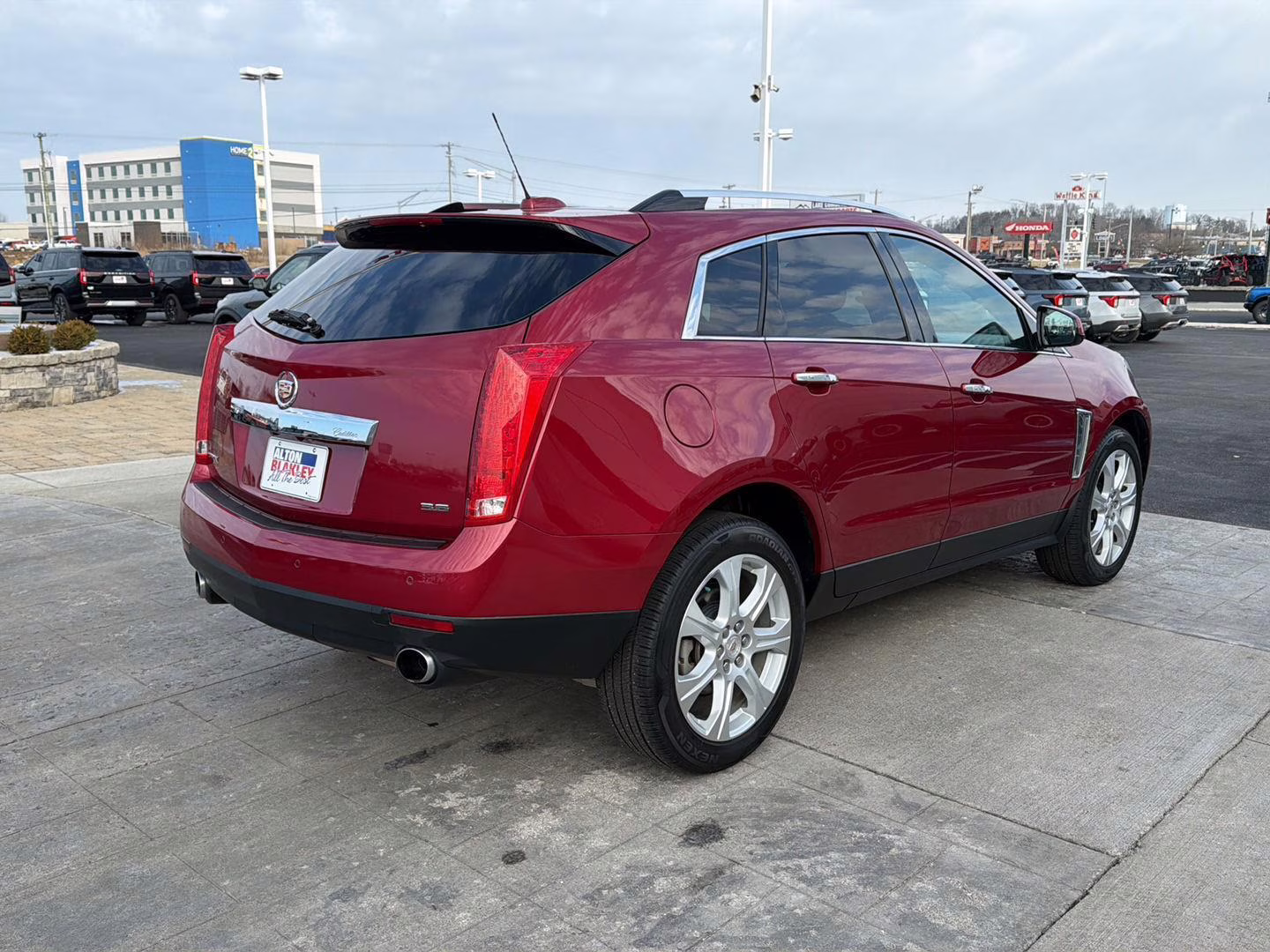 2016 Crystal Red Tintcoat Cadillac SRX Performance Collection FWD SUV