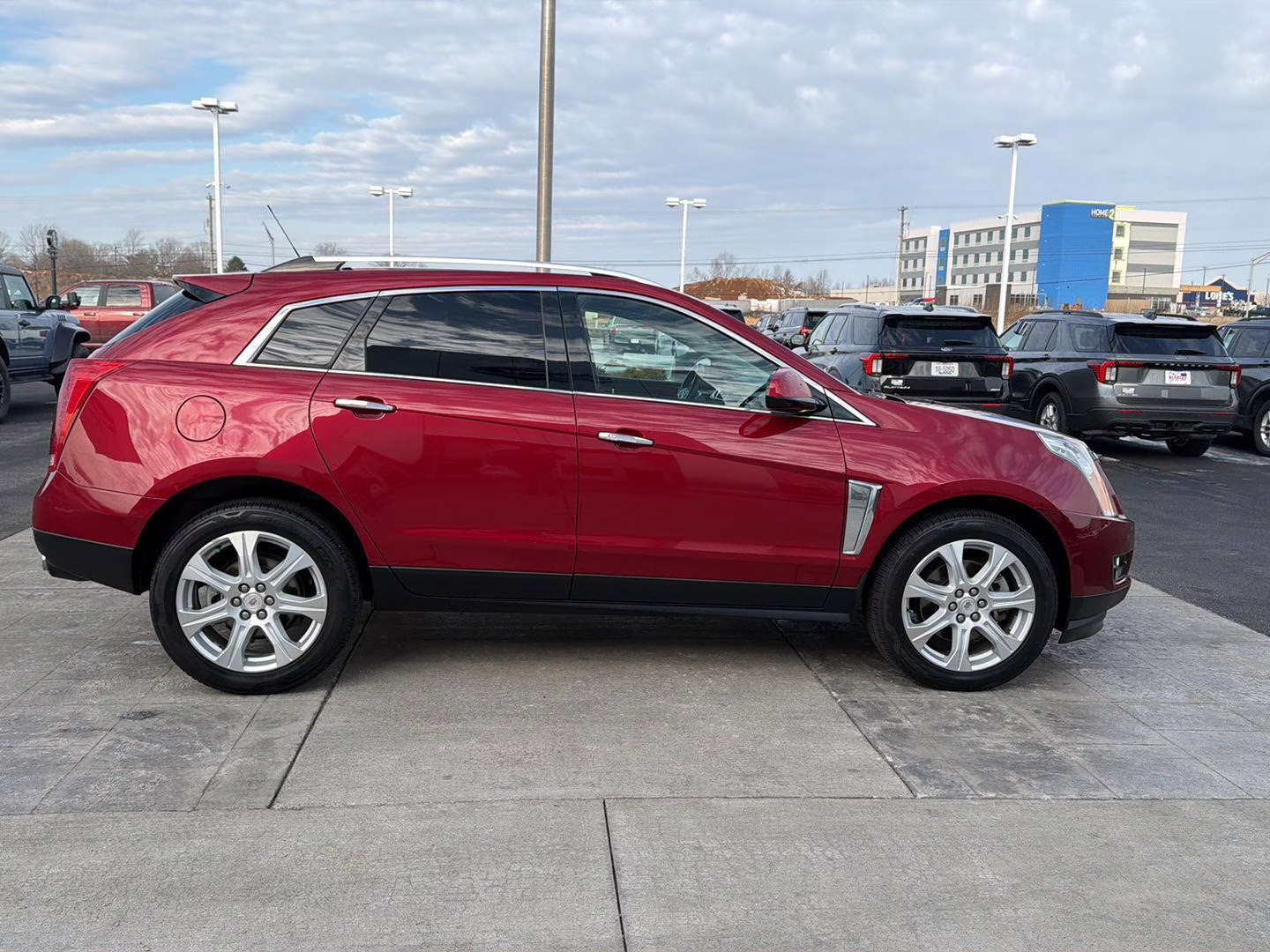 2016 Crystal Red Tintcoat Cadillac SRX Performance Collection FWD SUV