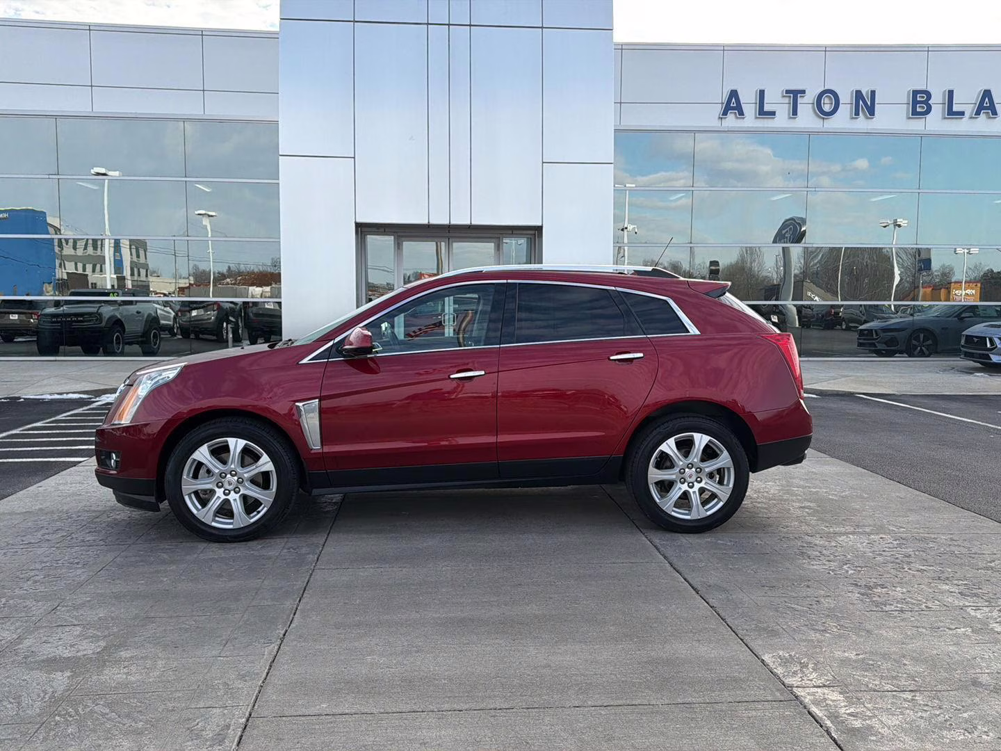 2016 Crystal Red Tintcoat Cadillac SRX Performance Collection FWD SUV