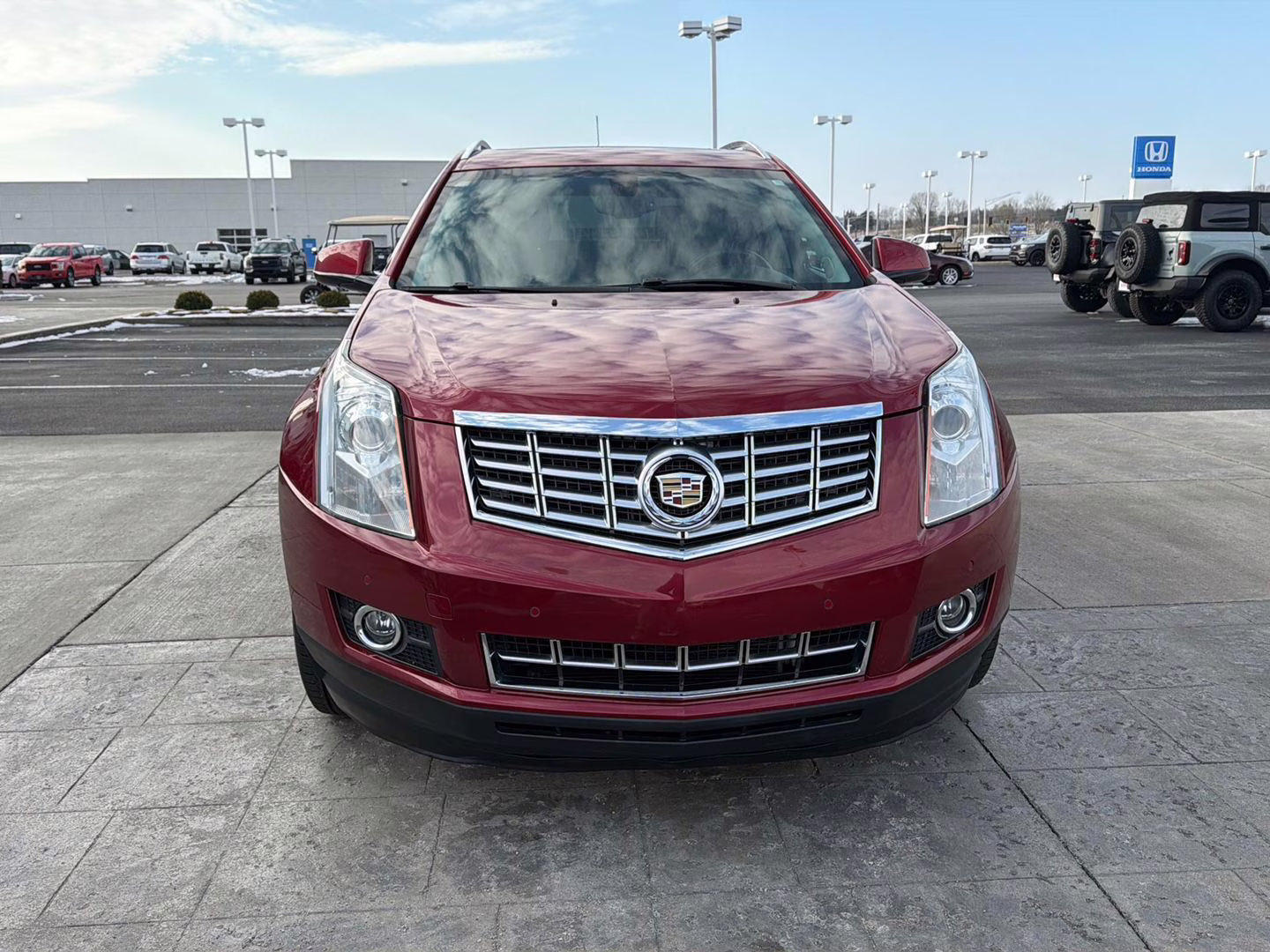 2016 Crystal Red Tintcoat Cadillac SRX Performance Collection FWD SUV