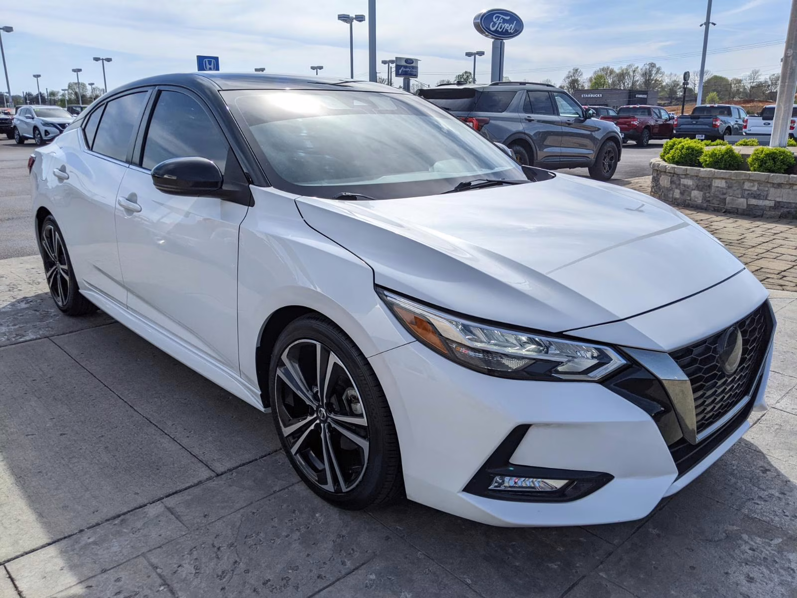 2023 Aspen White/Super Black Nissan Sentra SR FWD Sedan