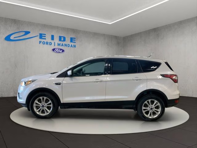 Used 2017 Ford Escape SE with VIN 1FMCU9GD7HUB10879 for sale in Mandan, ND