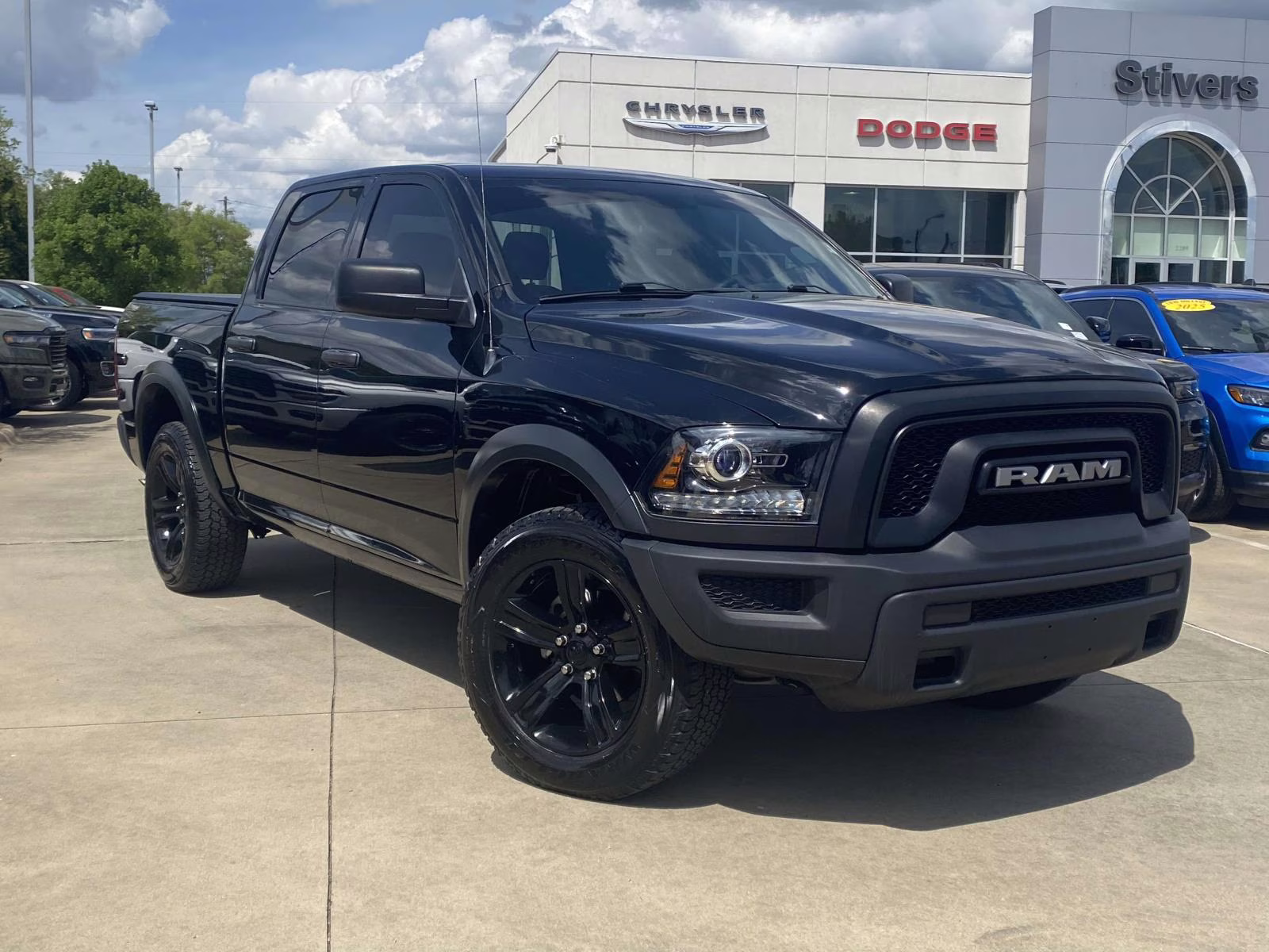 2024 Diamond Black Crystal Pearlcoat Ram 1500 Classic Warlock 4X4 Truck