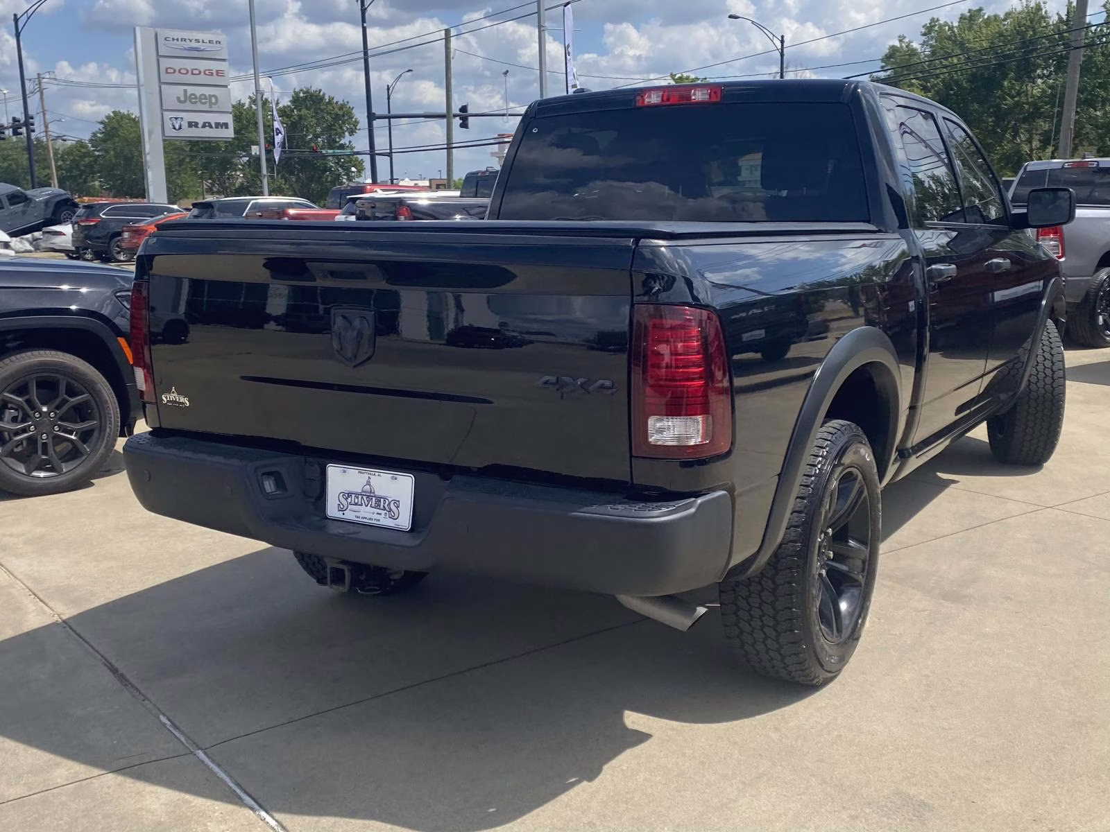 2024 Diamond Black Crystal Pearlcoat Ram 1500 Classic Warlock 4X4 Truck