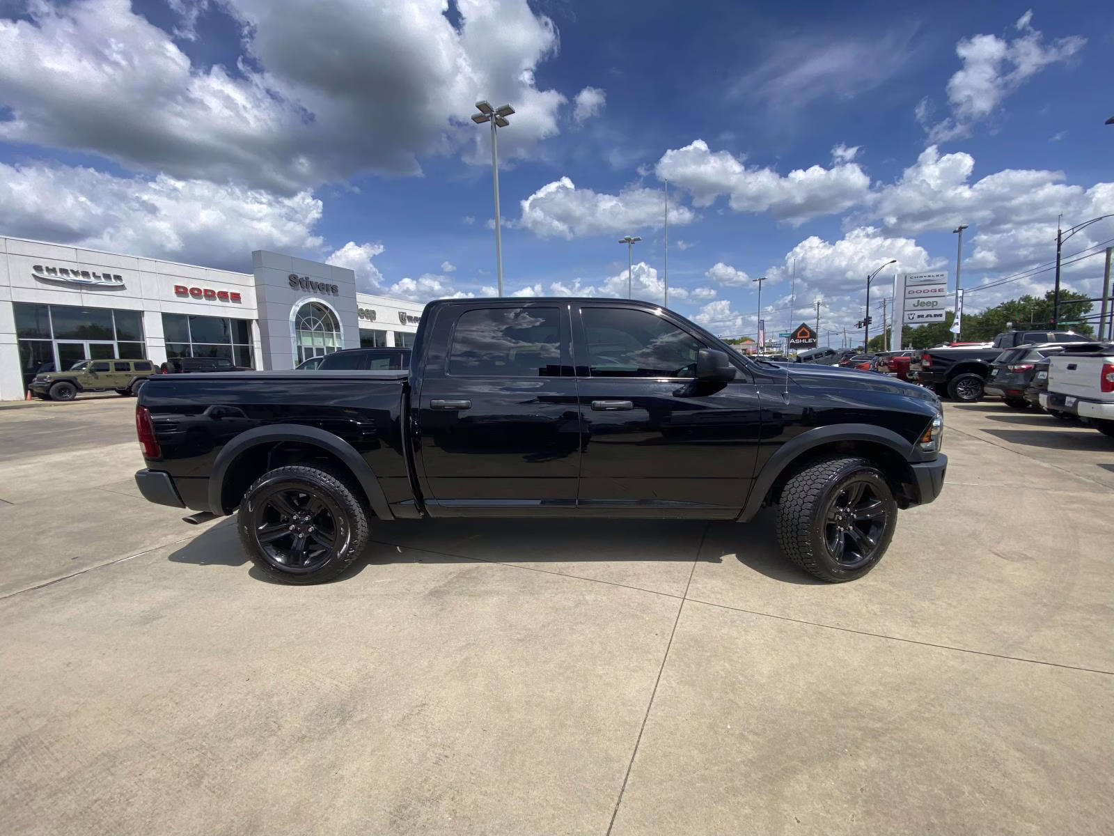 2024 Diamond Black Crystal Pearlcoat Ram 1500 Classic Warlock 4X4 Truck