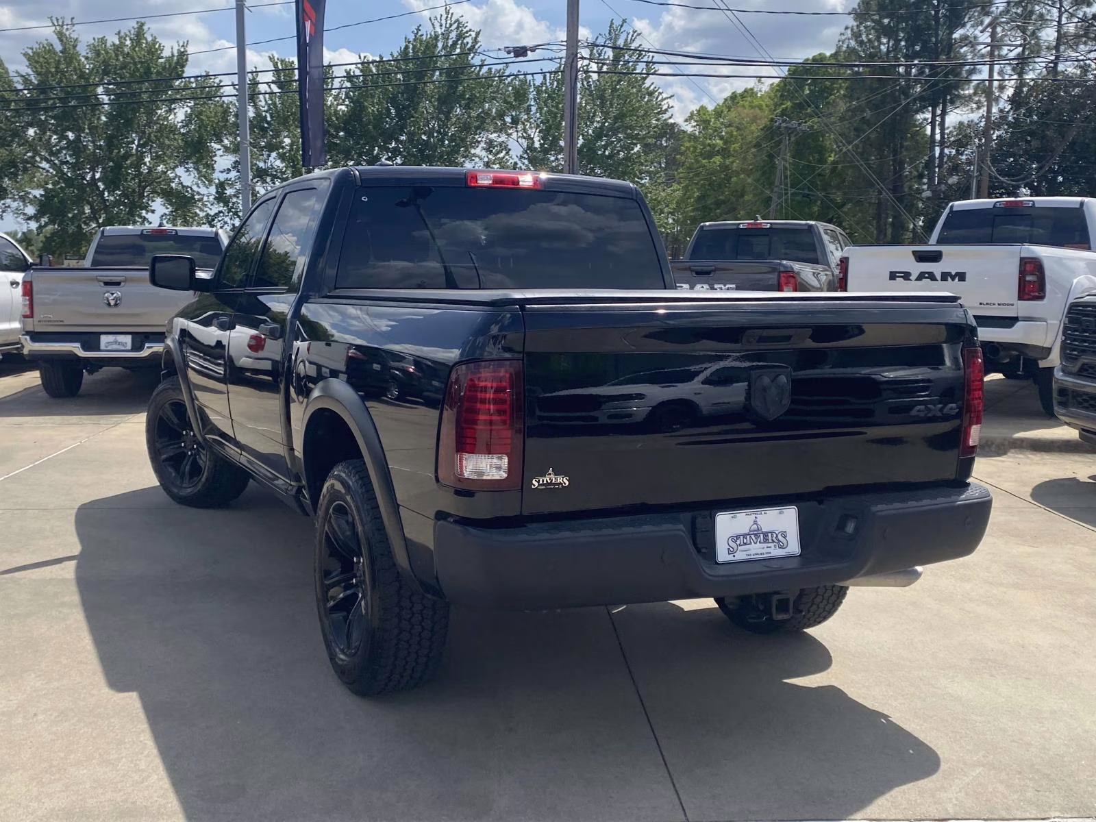 2024 Diamond Black Crystal Pearlcoat Ram 1500 Classic Warlock 4X4 Truck