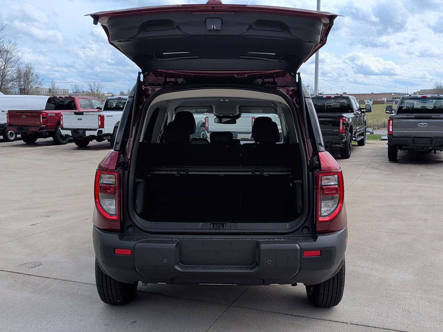 2026 Ruby Red Metallic Tinted Clearcoat Ford Bronco Sport Outer Banks 4X4 SUV