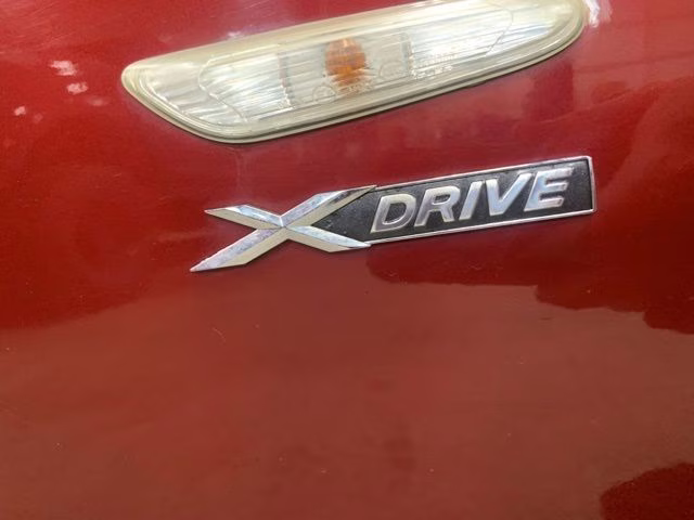 2011 Red Metallic BMW 3 Series 328i xDrive AWD Sedan