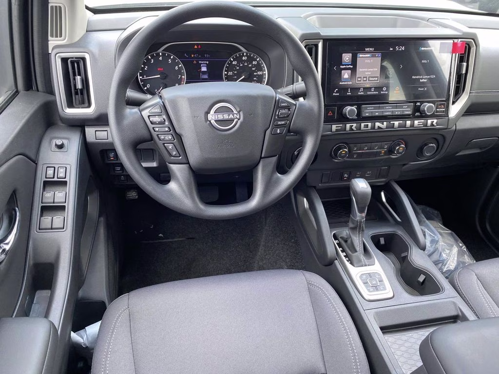 2026 Glacier White Nissan Frontier SV 4X4 Truck