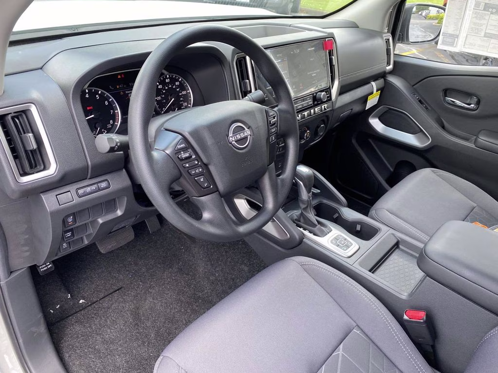 2026 Glacier White Nissan Frontier SV 4X4 Truck
