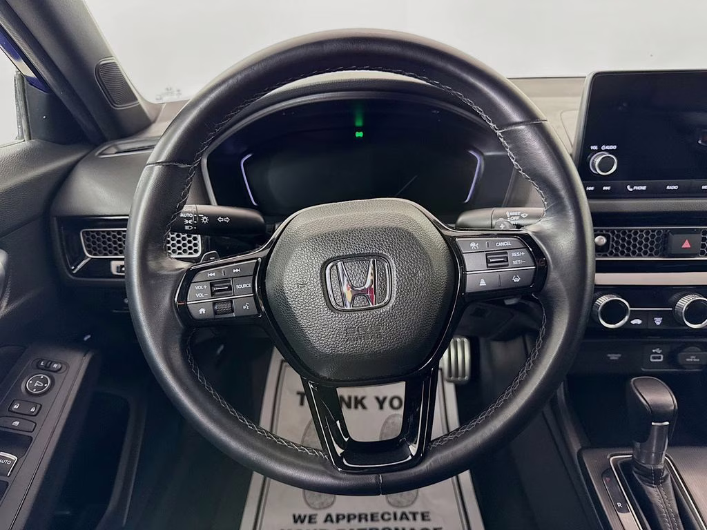 2024 Blue Honda Civic Sport FWD Sedan