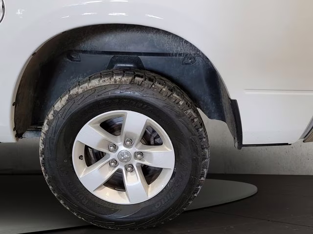 2023 Bright White Clearcoat Ram 1500 Classic SLT 4X4 Truck