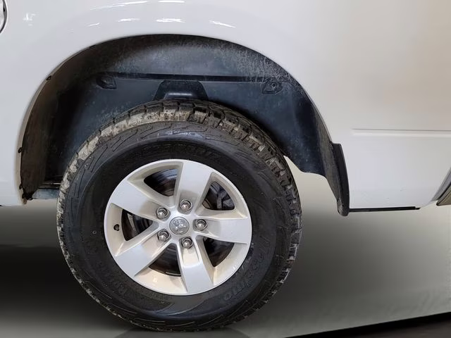 2023 Bright White Clearcoat Ram 1500 Classic SLT 4X4 Truck