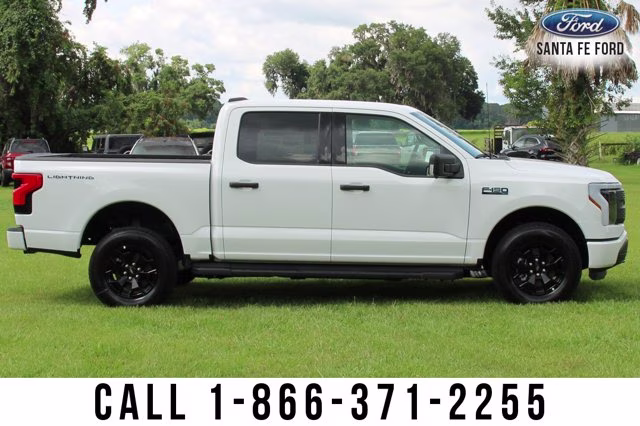 2025 White Ford F-150 Lightning XLT AWD Truck