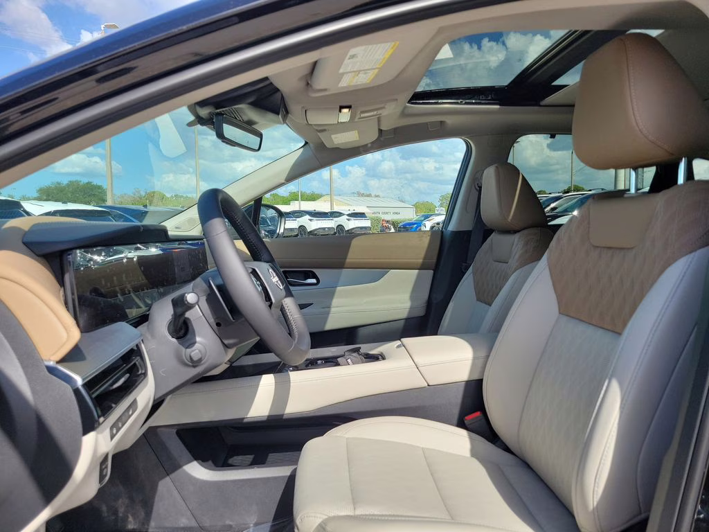 2026 Everest White Pearl/Super Black Nissan Rogue Platinum AWD SUV
