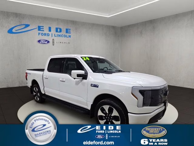 2024 Star White Metallic Tri-Coat Ford F-150 Lightning Platinum AWD Truck